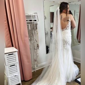 Elegant White Stella York Lace Wedding Dress with Train